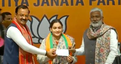 Aparna Yadav joins BJP in the presence of Uttar Pradesh Deputy Chief Minister Keshav Prasad Maurya and and its state chief Swatantra Dev Singh. Photo: Video screengrab/Twitter/@BJP4UP