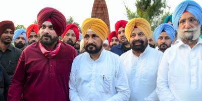 Punjab Chief Minister Charanjit Singh Channi along with Deputy CM Sukhjinder Singh Randhawa and PPCC President Navjot Singh Sidhu pay tribute at Jallianwala Bagh in Amritsar, Wednesday, Sept. 22, 2021. Photo: PTI