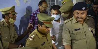 Ashish Mishra being taken from the crime branch office to be produced before a magistrate, in Lakhimpur Kheri, October 9, 2021. Mishra was arrested in connection with the Lakhimpur Kheri violence case. Photo: PTI