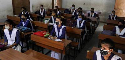 Representative image of school students in masks. Photo: Reuters