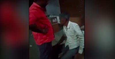 A screengrab showing Bhawarlal Jain being assaulted and questioned by BJP worker Dinesh Khushwaha in MP's Neemuch.