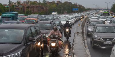 New Delhi: Vehicles move slowly during a traffic jam following heavy rain, near Akshardham in New Delhi, Monday, May 23, 2022. Strong winds accompanied by heavy rains early morning brought much-needed respite from the heat wave in Delhi. Photo: PTI