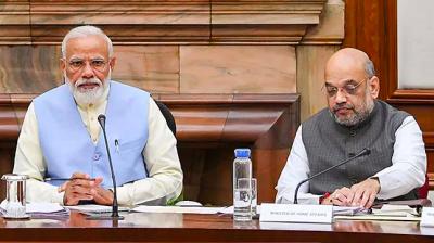 Narendra Modi and Amit Shah (right), two members of the Appointments Committee of the Cabinet, which will confirm the CDS's appointment when it takes place. Photo: PTI/File