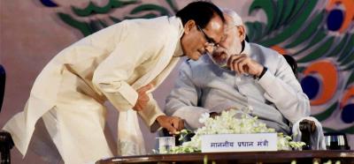 Prime Minister Narendra Modi and Madhya Pradesh chief minister Shivraj Singh Chauhan. Photo: PTI. 
