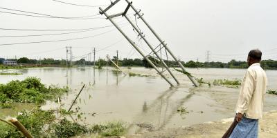 Kamrup: A damaged utility pole after flood due to heavy rains, at Rangia in Kamrup district, Sunday, June 19, 2022. Photo: PTI