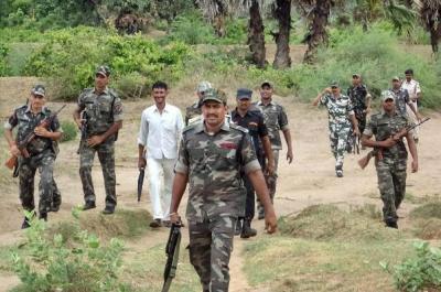 Representative image of security personnel at a combing operation against Maoists in the Nawadah forest, Bihar. Photo: PTI