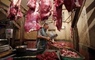 Representative image of a butcher cutting meat in Mumbai. Photo: Reuters.