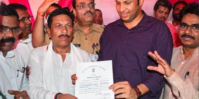 BJP candidate Ghanshyam Singh Lodhi receives the Certificate of Election after winning the Rampur Lok Sabha by-elections, in Rampur, Sunday, June 26, 2022. Photo: PTI