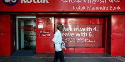 A man walks past the Kotak Mahindra Bank branch in New Delhi, India, September 6, 2017. Photo: Reuters/Adnan Abidi
