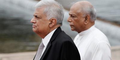 Sri Lanka's President Ranil Wickremesinghe and Prime Minister Dinesh Gunawardena look on after attending the inauguration of a new session of parliament and the first policy statement by Wickremesinghe, amid the country's economic crisis, in Colombo, Sri Lanka August 3, 2022. Photo: Reuters/ Dinuka Liyanawatte