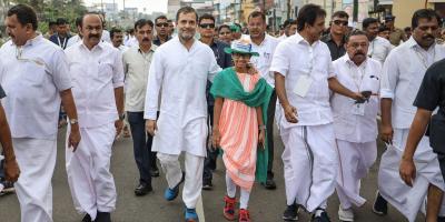 Congress leader Rahul Gandhi with a young Congress supporter during the Bharat Jodo march in Kerala. Photo: PTI.