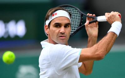 Tennis - Wimbledon - All England Lawn Tennis and Croquet Club, London, Britain - July 3, 2021 Switzerland's Roger Federer in action. Photo: Reuters/Toby Melville/File Photo