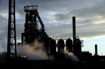 One of the blast furnaces of the Tata Steel plant is seen at sunset in Port Talbot, South Wales in this May 31, 2013 file photo. Photo: Reuters/Rebecca Naden/Files
