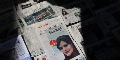FILE PHOTO: A newspaper with a cover picture of Mahsa Amini, a woman who died after being arrested by the Islamic republic's 