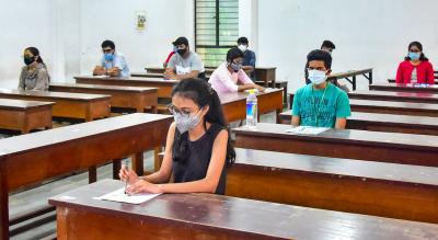 Representative image of students appearing for an exam in masks. Photo: PTI