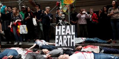 Climate change activists protest on Wall St in Lower Manhattan during Extinction Rebellion protests in New York City, October 7, 2019. Photo: REUTERS/Shannon Stapleton