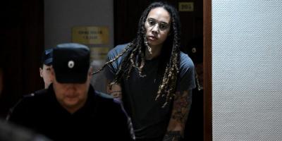 US basketball player Brittney Griner, who was detained at Moscow's Sheremetyevo airport and later charged with illegal possession of cannabis, is escorted in a court building in Khimki outside Moscow, Russia August 4, 2022. Photo: Kirill Kudryavtsev/Pool via Reuters