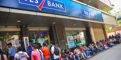 File image. Account holders queue up outside Yes Bank to withdraw money, in Mumbai, Saturday, March 7, 2020. Photo: PTI