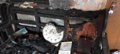 A burnt clock inside a riot-affected house in North East Delhi’s Chand Bagh. Photo: Ismat Ara