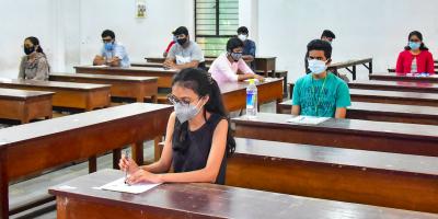 Representative image of students appearing for an exam in masks. Photo: PTI