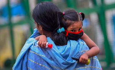 Representative image of a mother and her child during the lockdown in Delhi. Photo: PTI