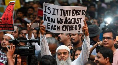 Representational image. Citizens hold placards during a silent protest 