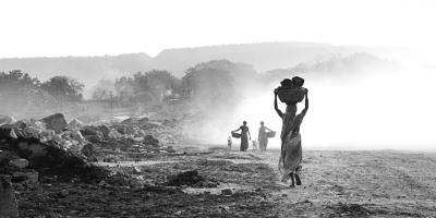 Representational image. Women trudge back and forth with baskets weighing 35 kilograms several times across the coalfields. Photo: Asha Thadani. 