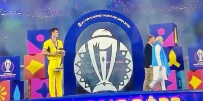 Prime Minister Narendra Modi walking away from Pat Cummins after handing him the trophy. Photo: Screengrab from video