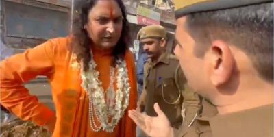 BJP MLA Balamukund Acharya arguing with a police official. Photo: Screengrab from video,