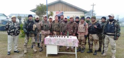 Manipur police with recovered arms. Photo: X/@manipurpolice