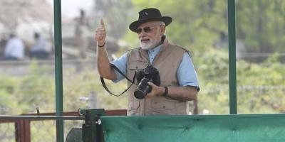 FILE IMAGE. Prime Minister Narendra Modi poses after opening the quarantine enclosure's door to release the cheetahs at Kuno National Park in Madhya Pradesh. Photo: PMO