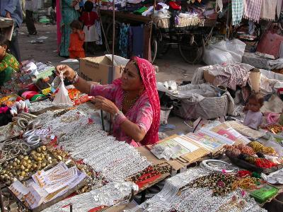 Representative image of a woman selling wares in Jodhpur. Photo: Gilbert Laszlo Kallenborn/Flickr (CC BY-NC-ND 2.0 DEED)