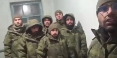 A screengrab of the seven men stuck in Russia. Photo: Twitter