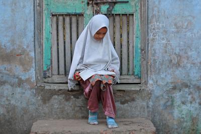 A young student at a madrasa. Photo: Meena Kadri/Flickr (CC BY-NC-ND 2.0 DEED)
