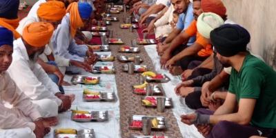 Sikhs and Muslims during Iftar at Gurdwara Singh Sabha Jainpur village in Malerkotla. Photo: By arrangement.
