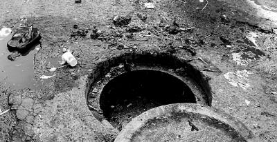 Representative image of an open manhole. Photo: Sharada Prasad CS/Flickr, CC BY 2.0